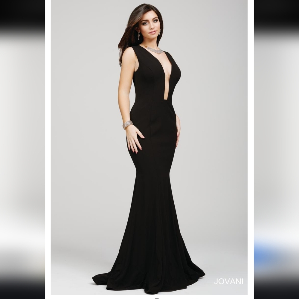 JOVANI Gorgeous fitted trumpet gown with a sexy plunging neckline